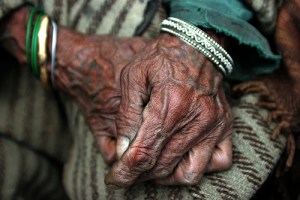 Worn Hands trusting hands